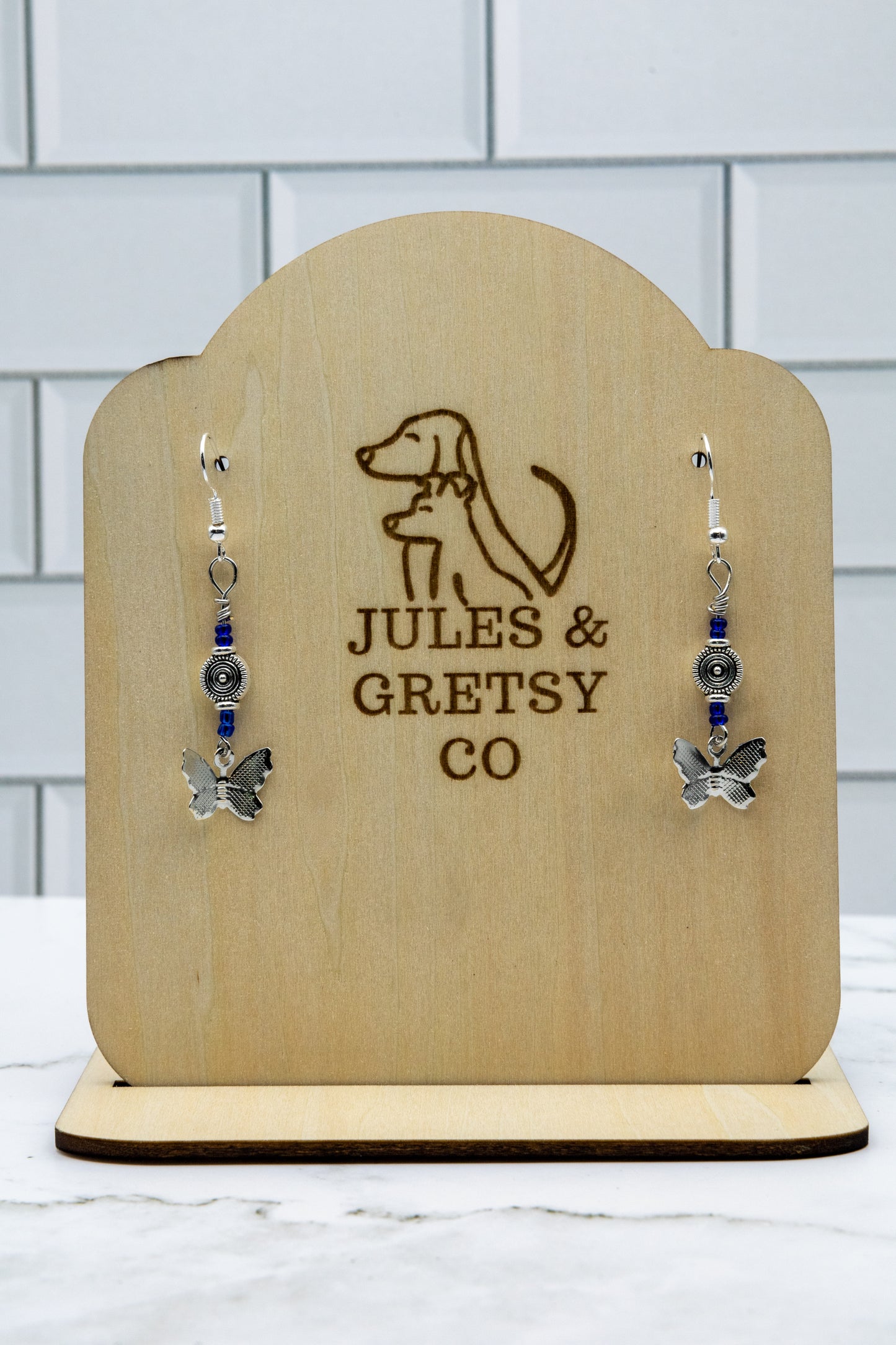 Butterfly and gemstones earrings